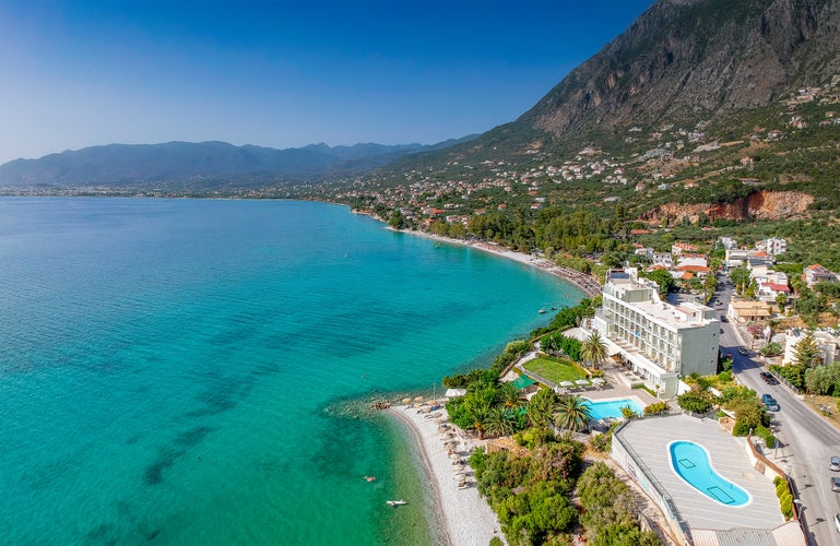 Photo of Aerial seaside view of Almyros beach and luxurious seside hotels in Kalamata, Messenia, Greece.