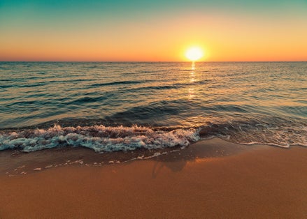 Photo of fig Tree Bay sandy beach at sunset in Protaras.