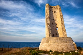 Photo of aerial view of Otranto town in Puglia with crystal turquoise waters, Italy.