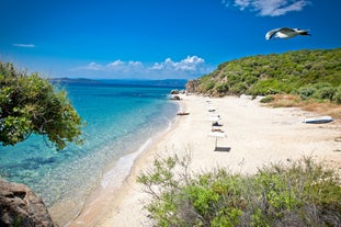 Photo of Ouranoupolis tower in Chalkidiki, Greece on a summer day.