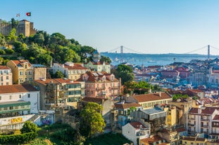 Photo of Lisbon City Skyline with Sao Jorge Castle and the Tagus River, Portugal.