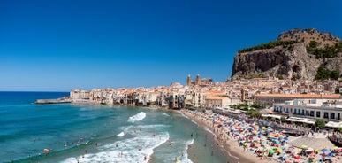 Photo of view of Cefalu and Promontorio de Torre Caldura seen from Norman Castle, La Rocca park, Italy.