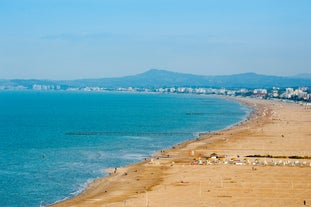 Photo of amazing landscape with beautiful sea beach on sunset in Viserbella, Italy.