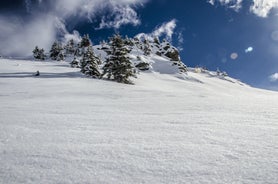 photo of an aerial view of Gstaad in winter. Village and holiday resort in the Swiss Alps.