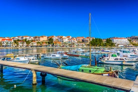 Photo of aerial view of Stobrec popular touristic destination on Adriatic sea, suburb of city of Split, Croatia.