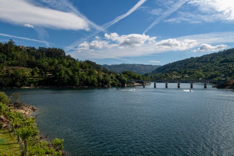 Photo of Scenic view of the lake at the Canicada Dam at the Peneda Geres National Park, in Portugal, Europe.