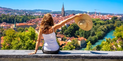 Panoramic view of historic Zurich city center with famous Fraumunster, Grossmunster and St. Peter and river Limmat at Lake Zurich on a sunny day with clouds in summer, Canton of Zurich, Switzerland