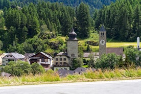 Photo of  beautiful Scuol town in Swiss Alps and Inn river, Switzerland.