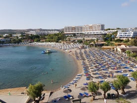 Photo of aerial view of seaside village of Archangelos in Laconia, Greece.