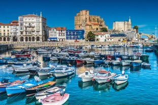 Photo of aerial view of Otranto town in Puglia with crystal turquoise waters, Italy.