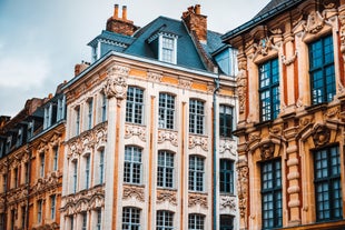 Photo of traditional half-timbered houses in the old town of Rennes, Brittany, France.