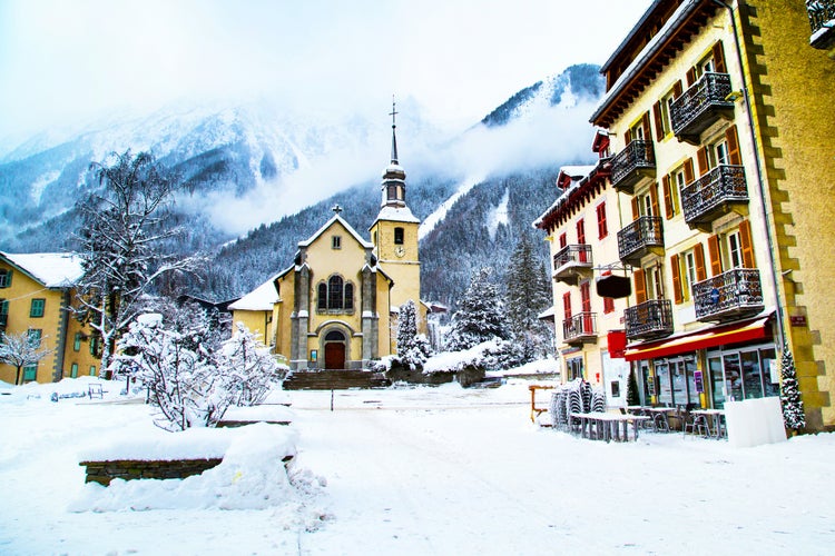 Church in Chamonix, France, French Alps in winter, street view and snow mountains.