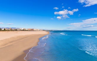 photo of aerial panoramic drone point of view Cabo Roig coastline with blue Mediterranean Seascape view, residential buildings near sandy beach at sunny summer day. Province of Alicante, Costa Blanca. Spain.