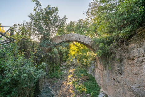 photo of the amazing views of Vespasianus Titus Tunnel is an ancient water tunnel built for the city of Seleucia Pieria, the port of Antioch (modern Antakya), Turkey.
