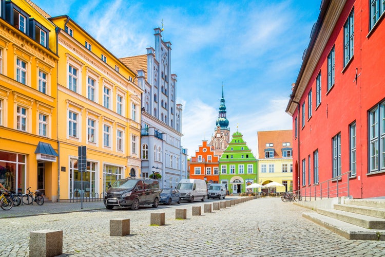 Photo of scenic view of the historic city center of Greifswald on a beautiful sunny day with blue sky and clouds in summer, Germany.