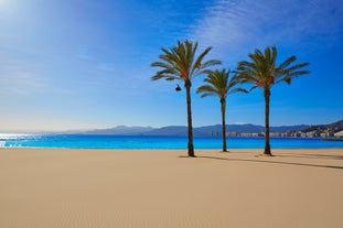 Photo of aerial view from a hill on a Spanish resort city Cullera, Spain.