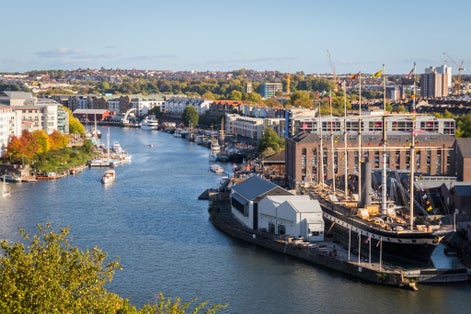 photo of view of Bristol waterfront and cityscape in England, featuring Bristol Harbourside, Spike Island, Bristol Feeder Canal and Brunel's SS Great Britain museum ship