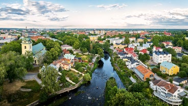 Photo of Motala stream in Norrkoping during fall, that is a historic industrial town in Sweden.