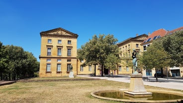 Photo of Metz city view of Petit Saulcy an Temple Neuf and Moselle River in Summer, France.