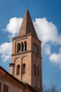 photo of view Bell tower of the Church of San Gregorio Magno, one of the oldest churches in Ferrara (X century), Emilia-Romagna, Italy.