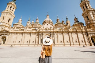 photo of summer view of Teruel with landmarks (Cathedral of Santa María de Mediavilla, Mausoleum of the Amantes) in Aragon, Spain.