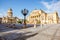 Photo of the Gendarmenmarkt square with concert house building and German cathedral during the morning light in Berlin city.