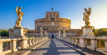 Aerial panoramic cityscape of Rome, Italy, Europe. Roma is the capital of Italy. Cityscape of Rome in summer. Rome roofs view with ancient architecture in Italy. 