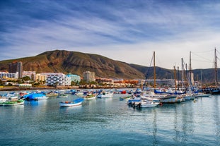 photo of aerial view of the beach and lagoon of Los Cristianos resort on Tenerife, Canary Islands, Spain.