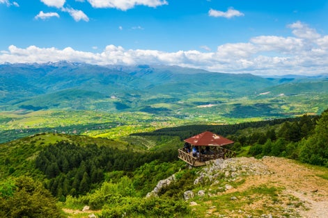 Photo of aerial view of a mountainous landscape in Macedonia view from the top of Vodno mountain near Skopje.