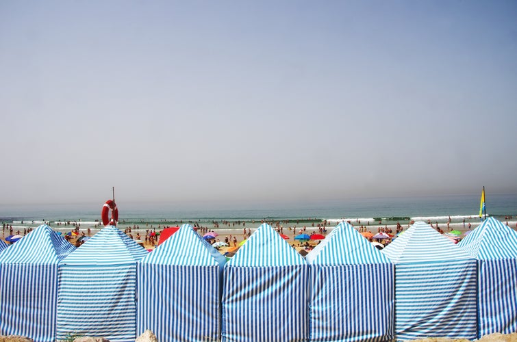 Photo of Almada beautiful beach on a sunny day, Portugal.