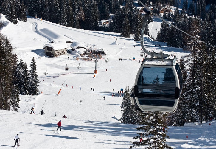 photo of Ski resort Madonna di Campiglio with cable car in Italy.