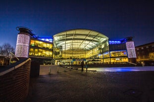 Photo of historic town houses at night on Quay Side in Norwich, Norfolk, United Kingdom.