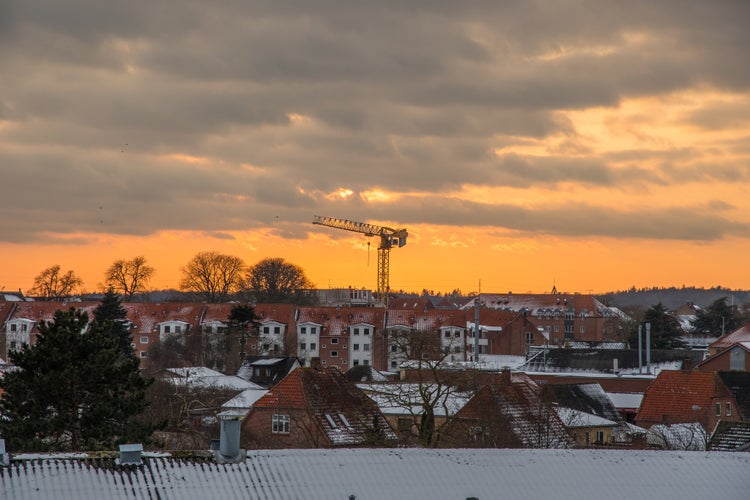 photo of view of Sunset above town of Vordingborg in Denmark on a winter day, Vordingborg, Denmark.