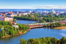 Aerial view of the Tampere city at sunset. Tampella building. View over Tammerkoski river in warm sunlight.