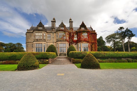 Photo of Muckross House and gardens in National Park Killarney, Ireland.