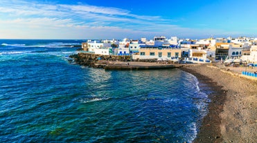 Photo of scenic aerial view of colorful traditional village of El Cotillo in Northen part of island. Canary islands of Spain.