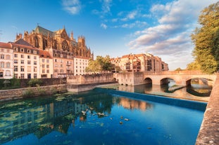 Photo of Metz city view of Petit Saulcy an Temple Neuf and Moselle River in Summer, France.