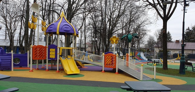 Photo of Colorful children's playground in Copou Park,Iasi,Romania .
