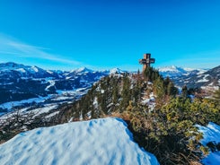 photo of beautiful alpine summer view with a church at Waidring, Tyrol, Austria.