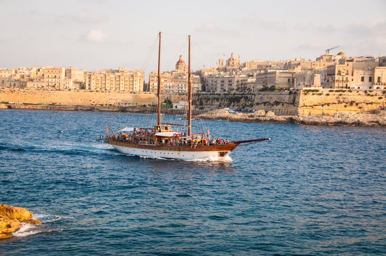 Photo of tourist boat sailing into Sliema, Malta.