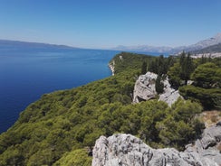 Photo of aerial view of gorgeous azure scene of summer Croatian landscape in Podgora, Dalmatia, Croatia.