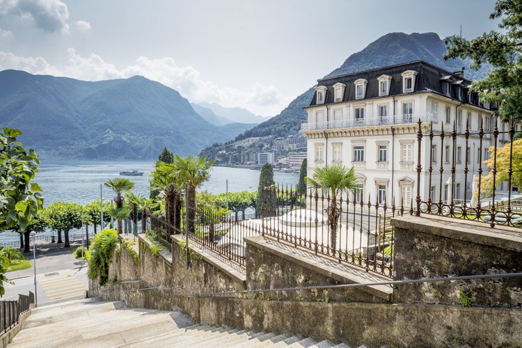 Photo of scenic view of Lugano city, Lugano lake, Switzerland.