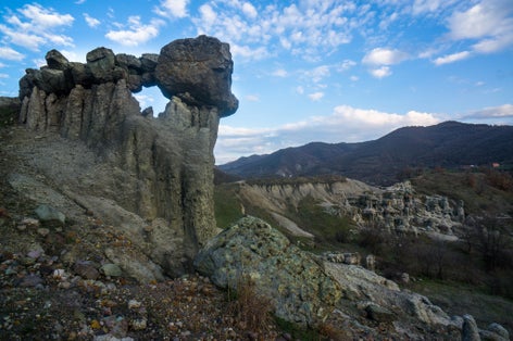 Photo of landscape with rock formation The Stone Dolls (Kameni kukli) of Kuklica near town of Kratovo, Republic of Macedonia.