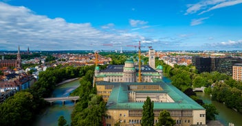 Panoramic view of historic Zurich city center with famous Fraumunster, Grossmunster and St. Peter and river Limmat at Lake Zurich on a sunny day with clouds in summer, Canton of Zurich, Switzerland