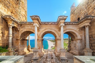 Photo of Kizil Kule or Red Tower and port aerial panoramic view in Alanya city, Antalya Province on the southern coast of Turkey.