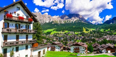 photo of the romantic, Snow covered Skiing Resort of Cortina d Ampezzo in the Italian Dolomites seen from Tofana with Col Druscie in the foreground.