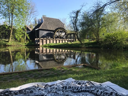 photo of view of park mill water picnic culture landscape summer wood wooden grass home park garden river lake blanket eindhoven netherlands.  