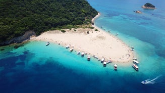 Photo of aerial view of famous sea turtle hatching area of Laganas as seen from Agios Sostis, Zakynthos island, Ionian Greece.