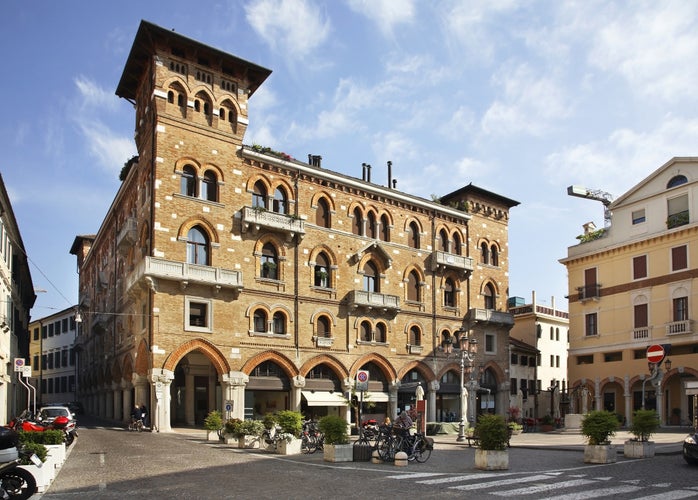 Treviso, Venetien - Italy -Historic red brick building with Romanesque windows, balconies and columns, located in Piazza San Vito, Treviso, Italy