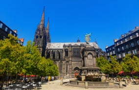 Photo of panoramic view of the city of Clermont-Ferrand with its cathedral, France.